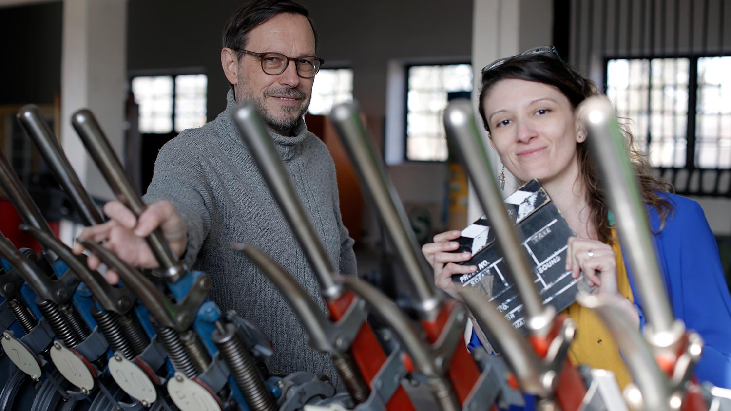 Natalia Irina Roman, Interview with Udo Dittfurth, director of S-Bahn Museum, in front of historical levers of an interlocking tower, Berlin (2019). Photographer: Dave Lojek